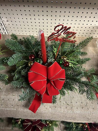 Single candle evergreen centerpiece